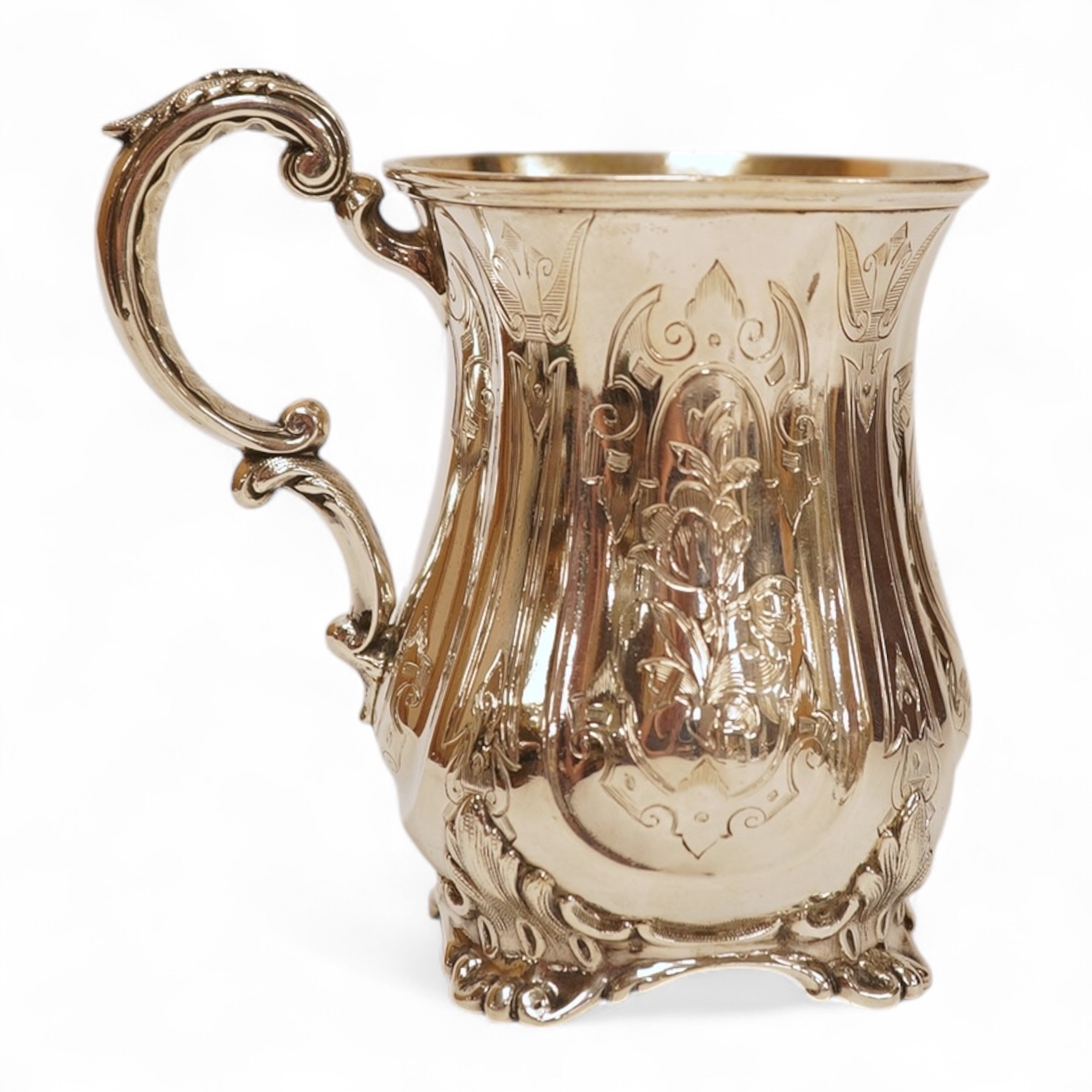 A Victorian engraved silver christening mug, with acanthus leaf capped scroll handle and engraved inscription, Martin, Hall & Co, Sheffield, 1856, 11cm, 5.3oz.